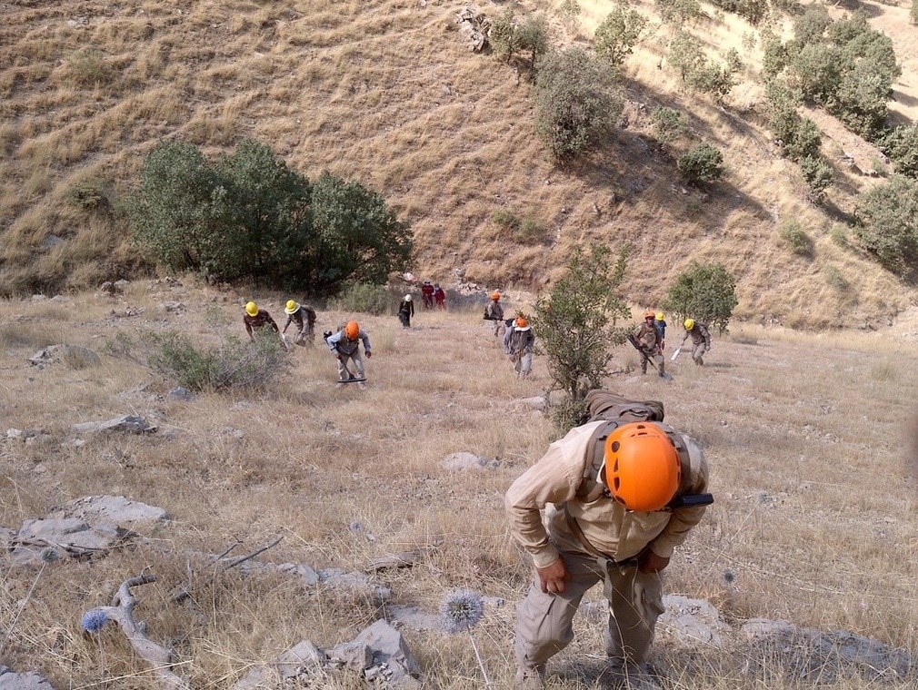 Guiding the De-Miners & Survey team up steep terrain, Kurdistan